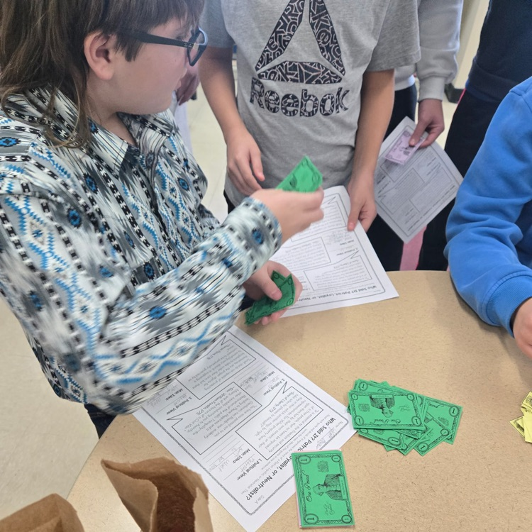 Students are learning about the road to the American Revolution.  The first stop is the Stamp Act. Students had to pay their "tax" to turn in their assignment. Students have also taken on a Colonial identity, complete with a "paying" job. 