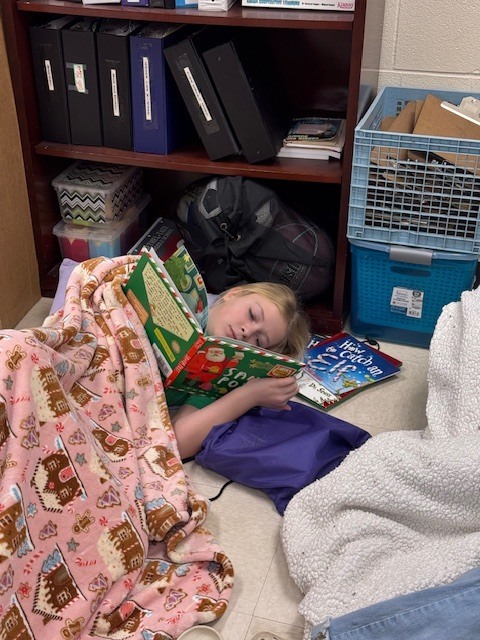 Sixth grade students participated in a Read-A-Thon before winter break, spending the day cozily reading books in the classroom.  