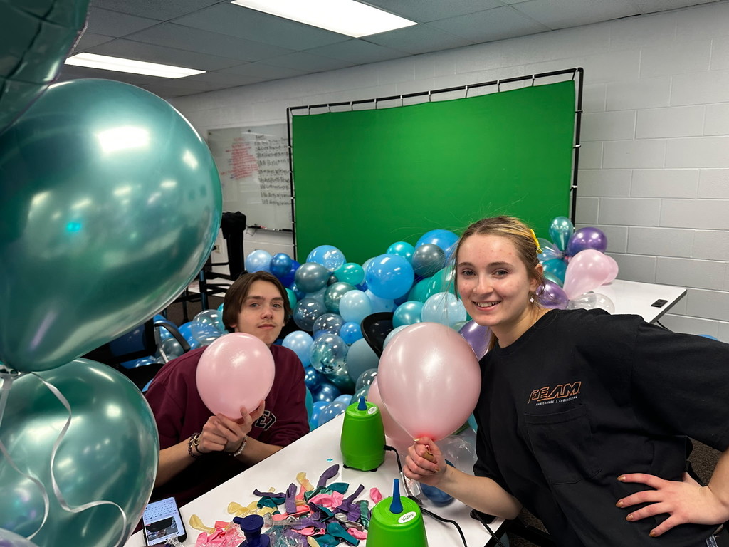 students with balloons