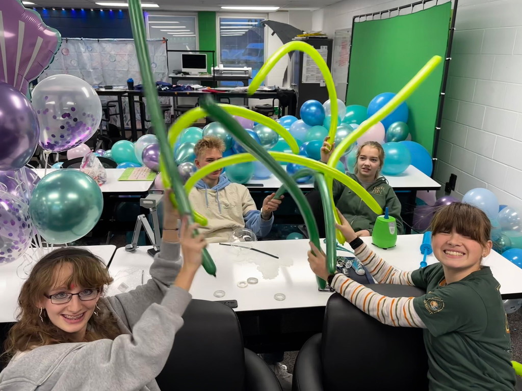 students with balloons