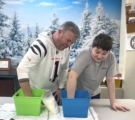 The recent weather brought a perfect opportunity to study how animals survive cold climates. Mr. Thomas joined students in a blubber challenge!
