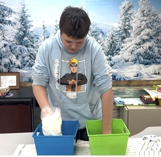The recent weather brought a perfect opportunity to study how animals survive cold climates. Mr. Thomas joined students in a blubber challenge!