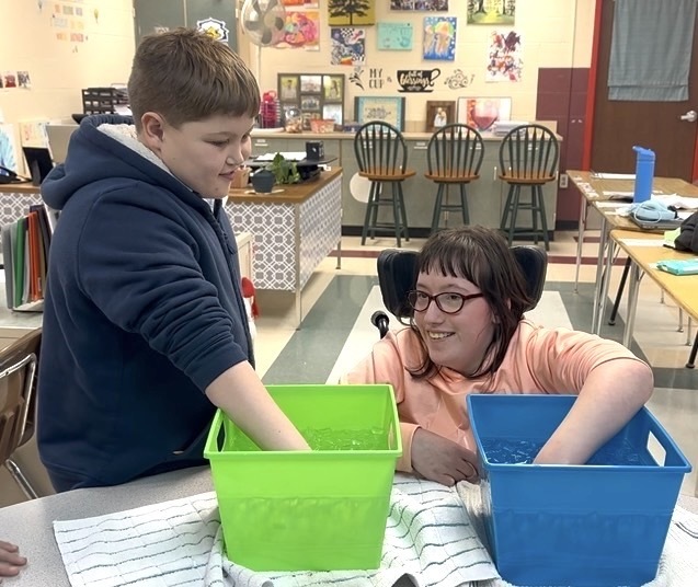 The recent weather brought a perfect opportunity to study how animals survive cold climates. Mr. Thomas joined students in a blubber challenge!