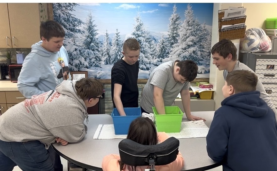 The recent weather brought a perfect opportunity to study how animals survive cold climates. Mr. Thomas joined students in a blubber challenge!