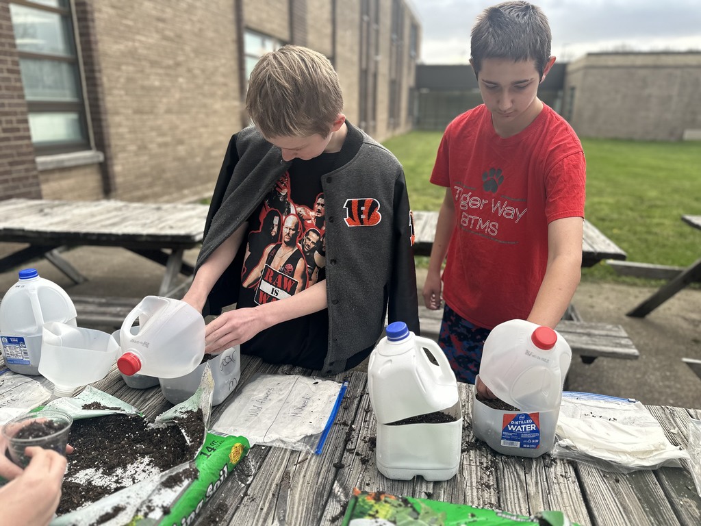 After studying the life cycles of the monarch butterfly and of plants, students used recycled milk jugs to plant seeds to grow their own butterfly gardens. They planted both milkweed and wildflowers.