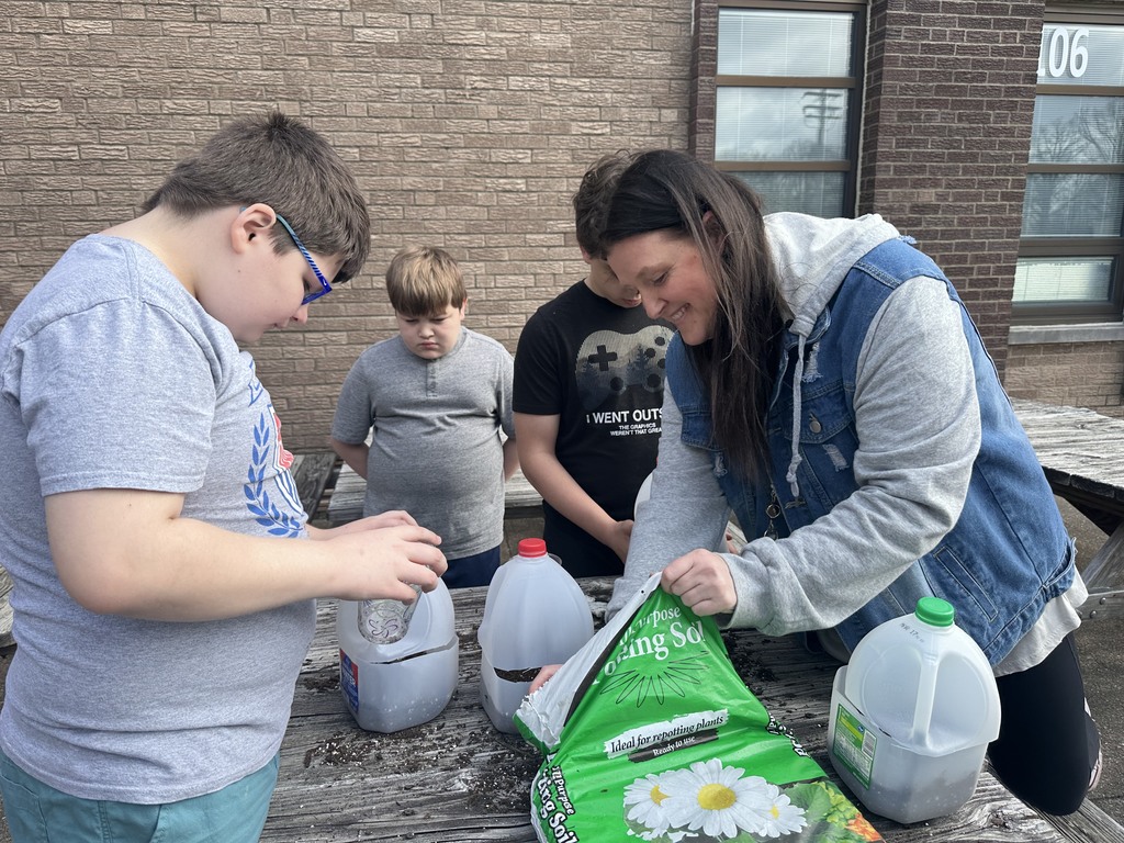 After studying the life cycles of the monarch butterfly and of plants, students used recycled milk jugs to plant seeds to grow their own butterfly gardens. They planted both milkweed and wildflowers.