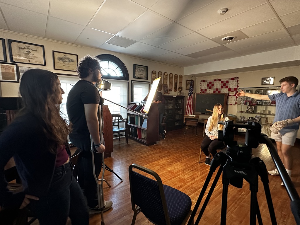 BTHS Academy students at the Bethel Historical Society Museum shooting video for a special project