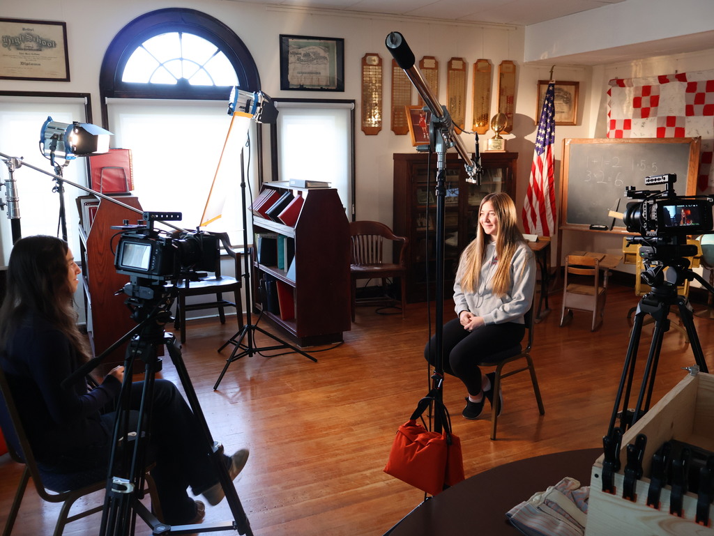 BTHS Academy students at the Bethel Historical Society Museum shooting video for a special project