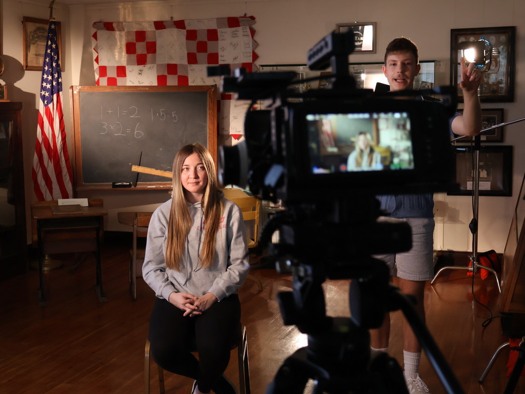 BTHS Academy students at the Bethel Historical Society Museum shooting video for a special project