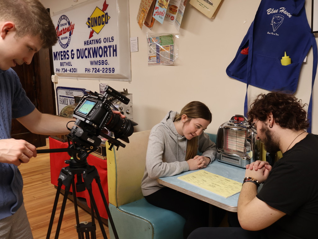 BTHS Academy students at the Bethel Historical Society Museum shooting video for a special project