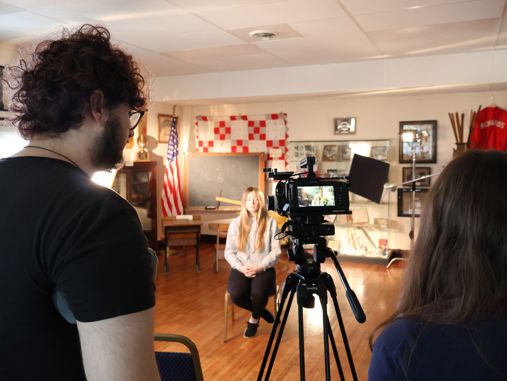 BTHS Academy students at the Bethel Historical Society Museum shooting video for a special project