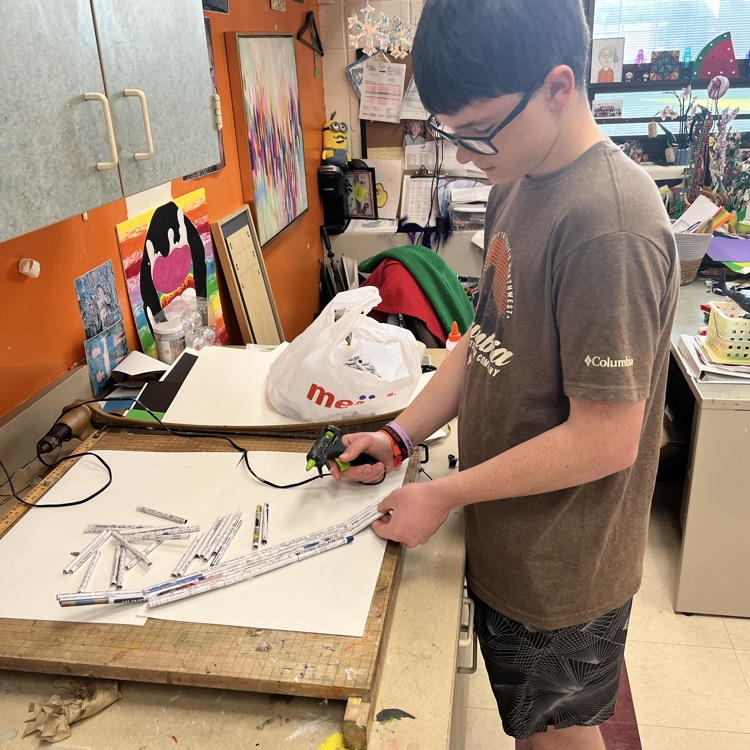 8th grade Art students working on their 3-D sculptures.  Students had the choice between clay, paper mâché or any other material to create a sculpture.