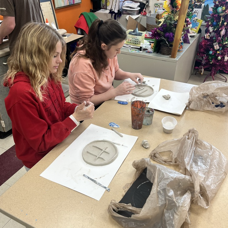 8th grade Art students working on their 3-D sculptures.  Students had the choice between clay, paper mâché or any other material to create a sculpture.