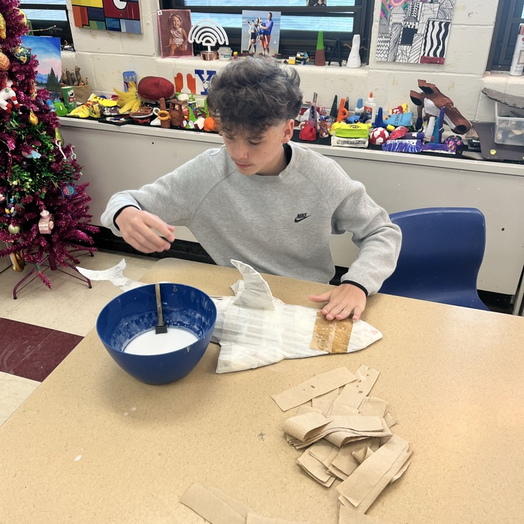 8th grade Art students working on their 3-D sculptures.  Students had the choice between clay, paper mâché or any other material to create a sculpture.