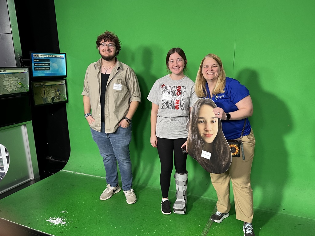 Bethel-Tate Content Creator students tour fox 19 news studio. As shown, three students in front of the green screen