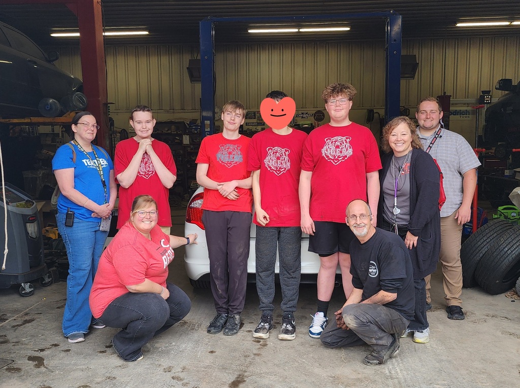 Students involved in outing to learn about working on cars for work experience