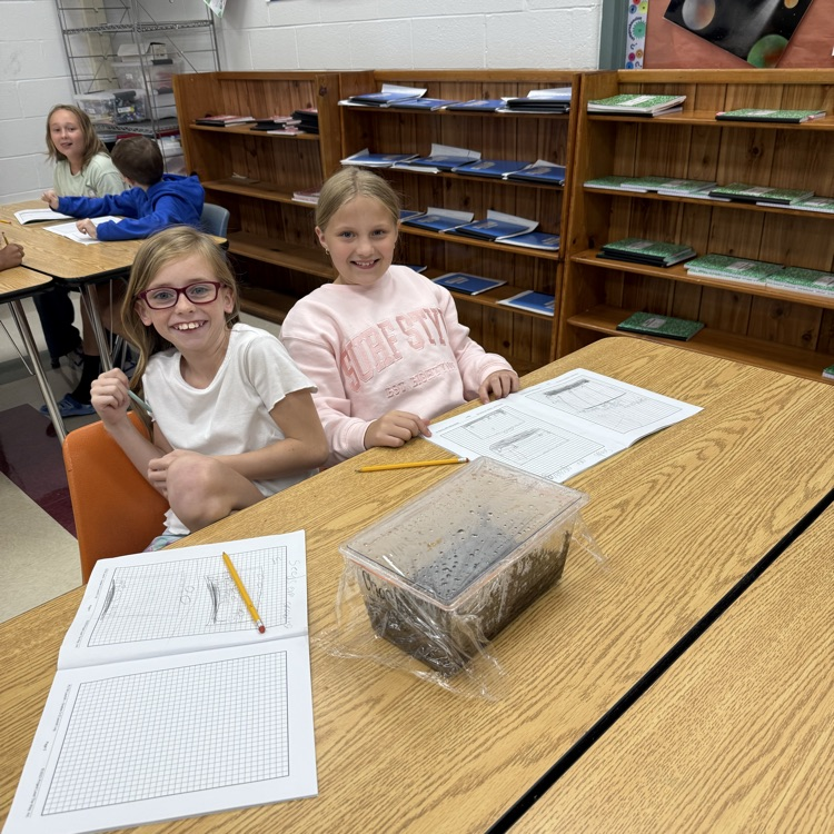 Students are learning about Earth’s water and interconnected systems by building terrariums that contain all four of Earth’s systems. 