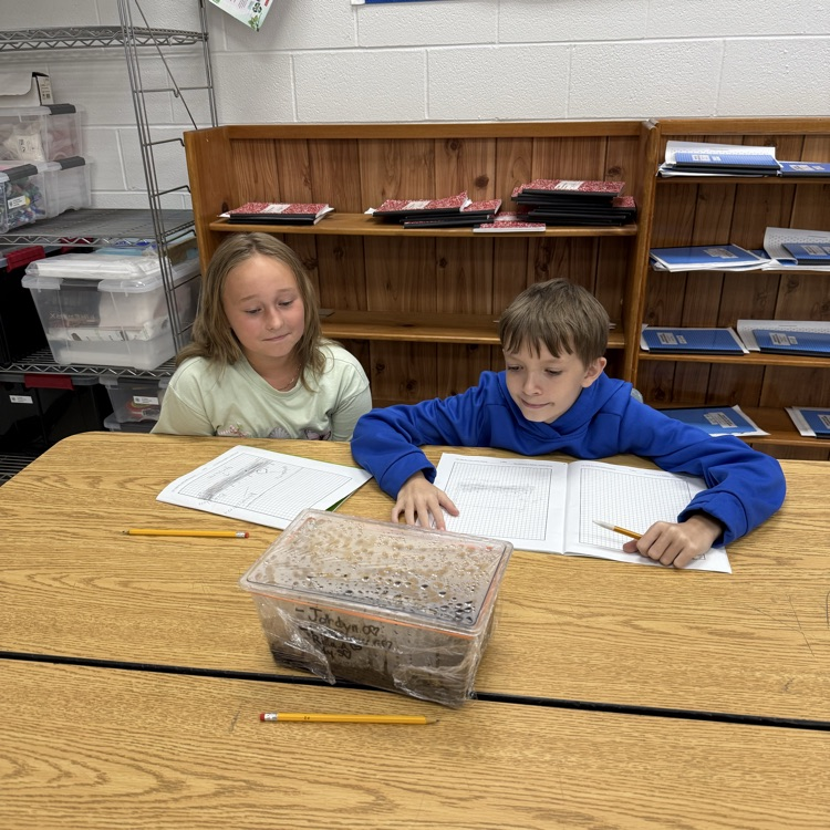 Students are learning about Earth’s water and interconnected systems by building terrariums that contain all four of Earth’s systems. 
