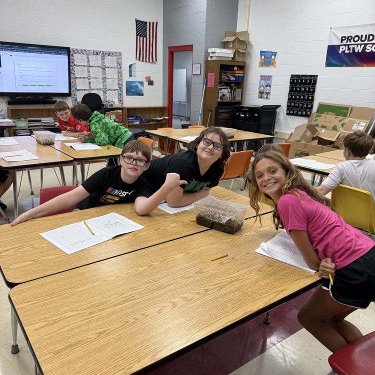 Students are learning about Earth’s water and interconnected systems by building terrariums that contain all four of Earth’s systems. 