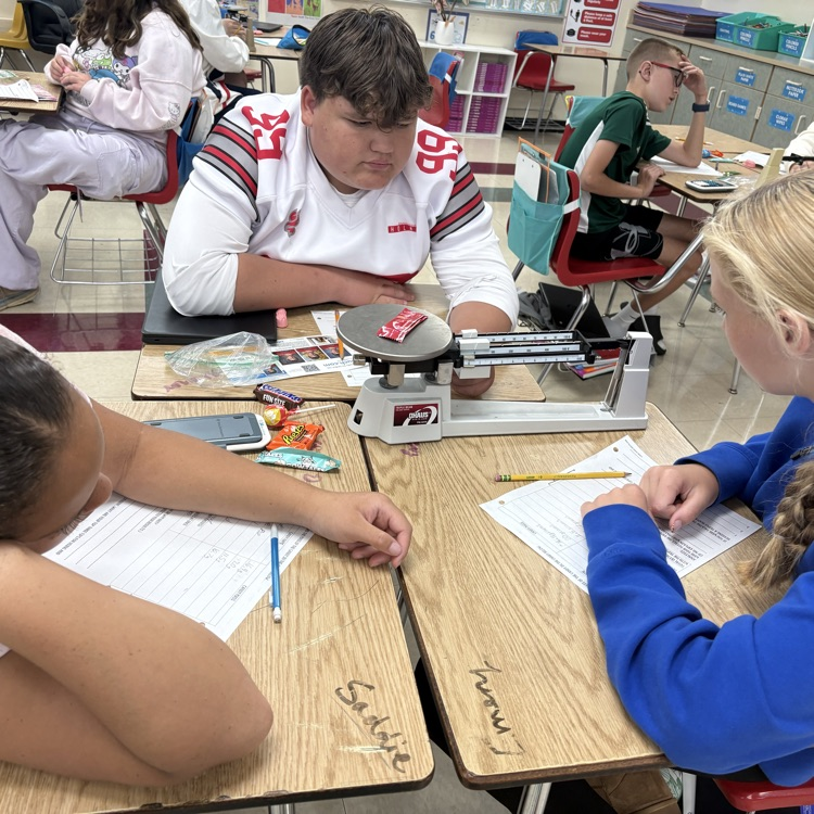 7th graders practiced using and reading a triple beam balance today while measuring the mass of different candies.