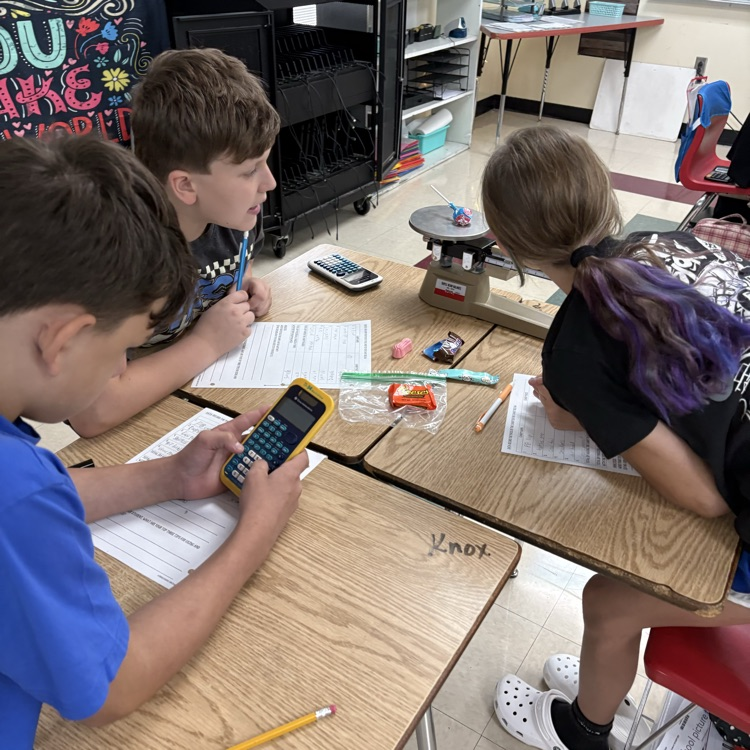7th graders practiced using and reading a triple beam balance today while measuring the mass of different candies.