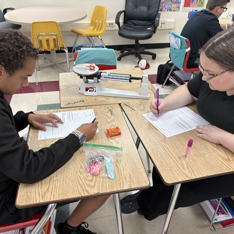 7th graders practiced using and reading a triple beam balance today while measuring the mass of different candies.