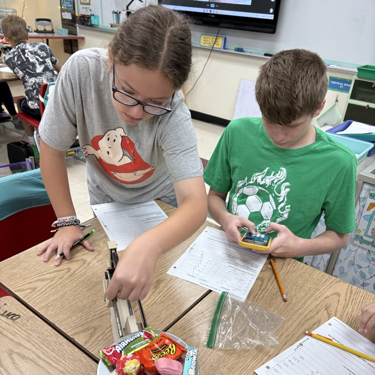 7th graders practiced using and reading a triple beam balance today while measuring the mass of different candies.