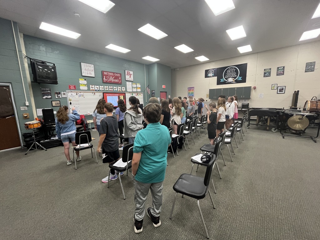 Working on conducting patterns in music class!