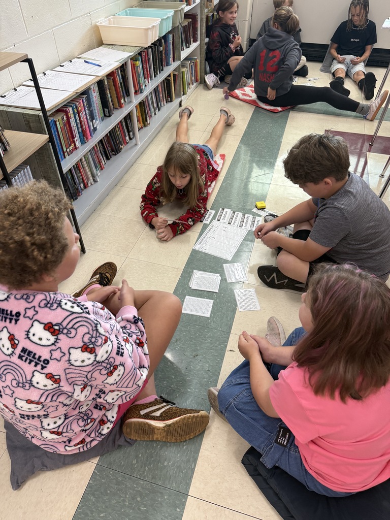 Students in Mrs. Parlier’s 5th grade language arts class completing a characterization card sort. 