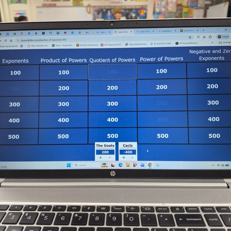Mr. Essig's math class reviewing for their Module 1 Exponents & Scientific Notation Test playing Jeopardy. 