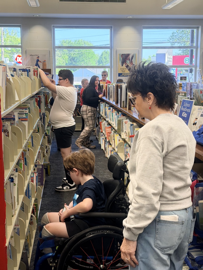 Students visit the public library to choose the perfect books to read and recommend to peers.