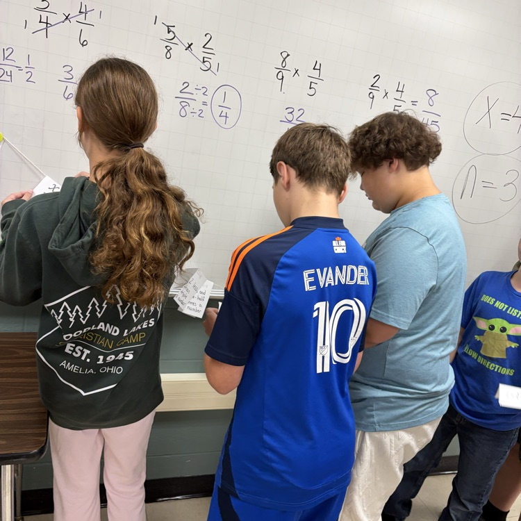 Students were solving algebraic equations and placing the final answer on the number line in the spot it should be on and why.