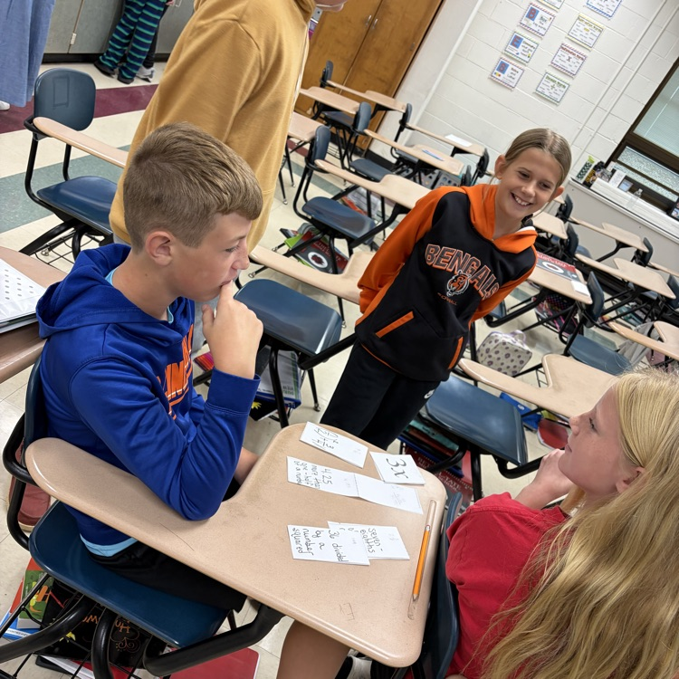 Students were solving algebraic equations and placing the final answer on the number line in the spot it should be on and why.