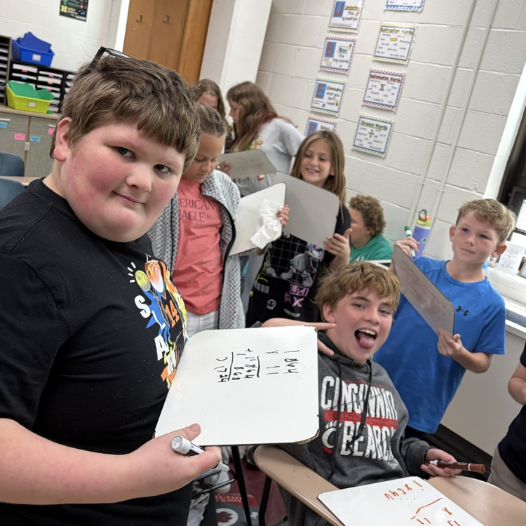 5th graders playing math jeopardy to review for their unit test 