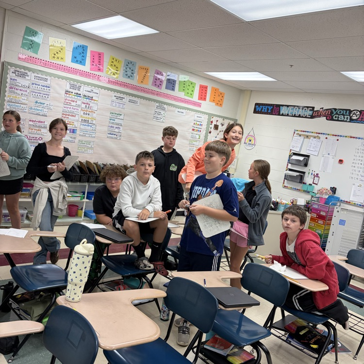 6th graders playing math jeopardy to review for their unit test 