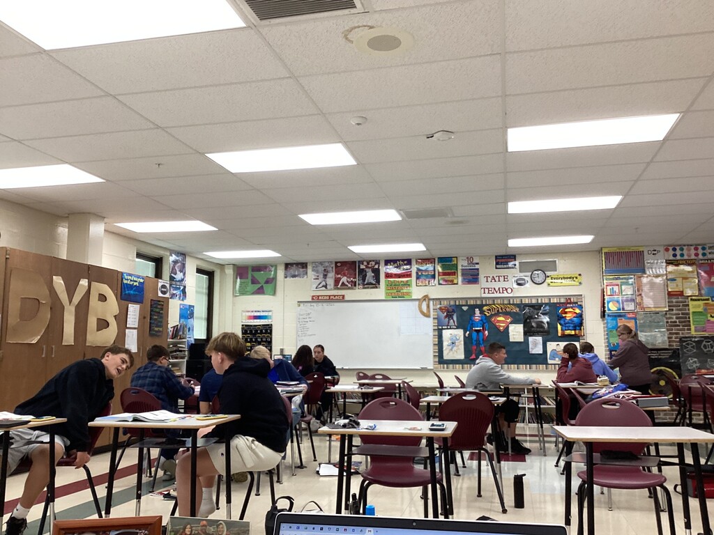 Mr. Essig’s math class completing their Module 3 Review in small groups.