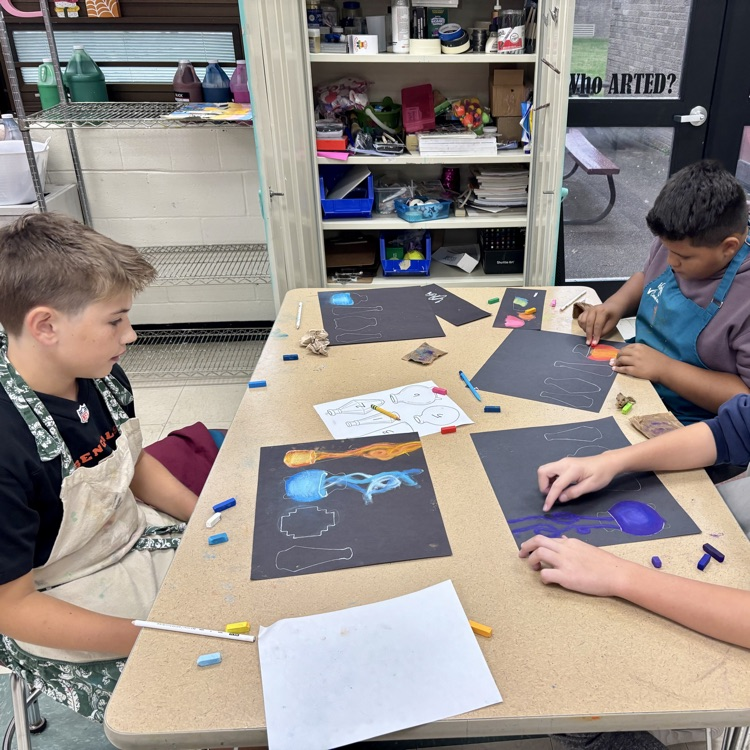 7th grade Art students are working on their Magic Potions chalk drawings.