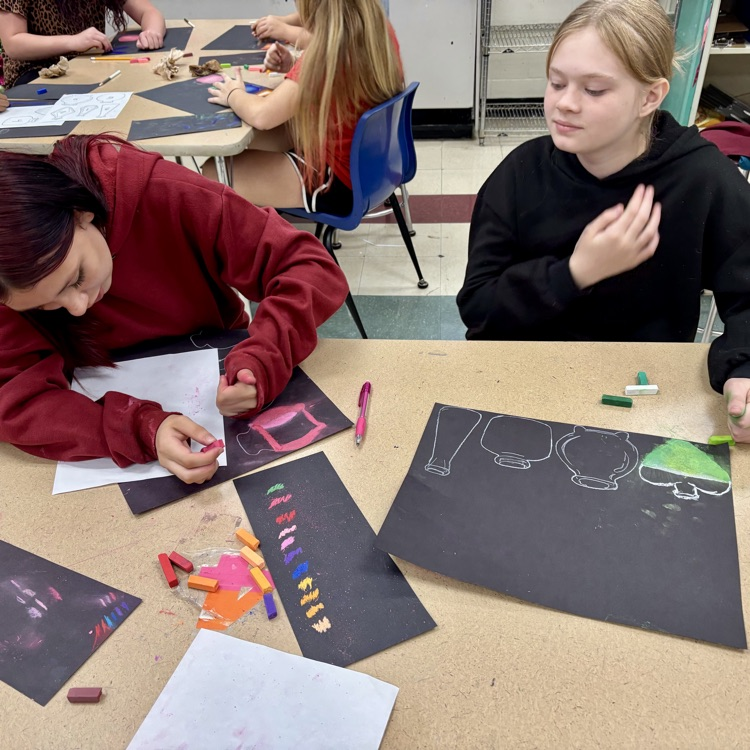 7th grade Art students are working on their Magic Potions chalk drawings.