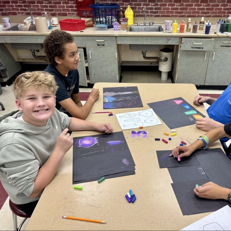 7th grade Art students are working on their Magic Potions chalk drawings.