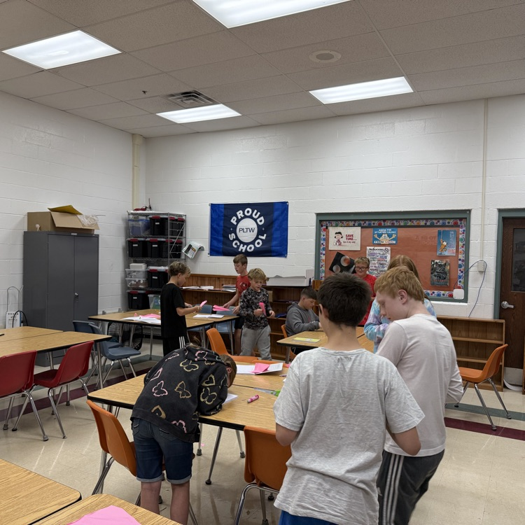Students are having fun designing, building, and testing their paper airplane gliders! 