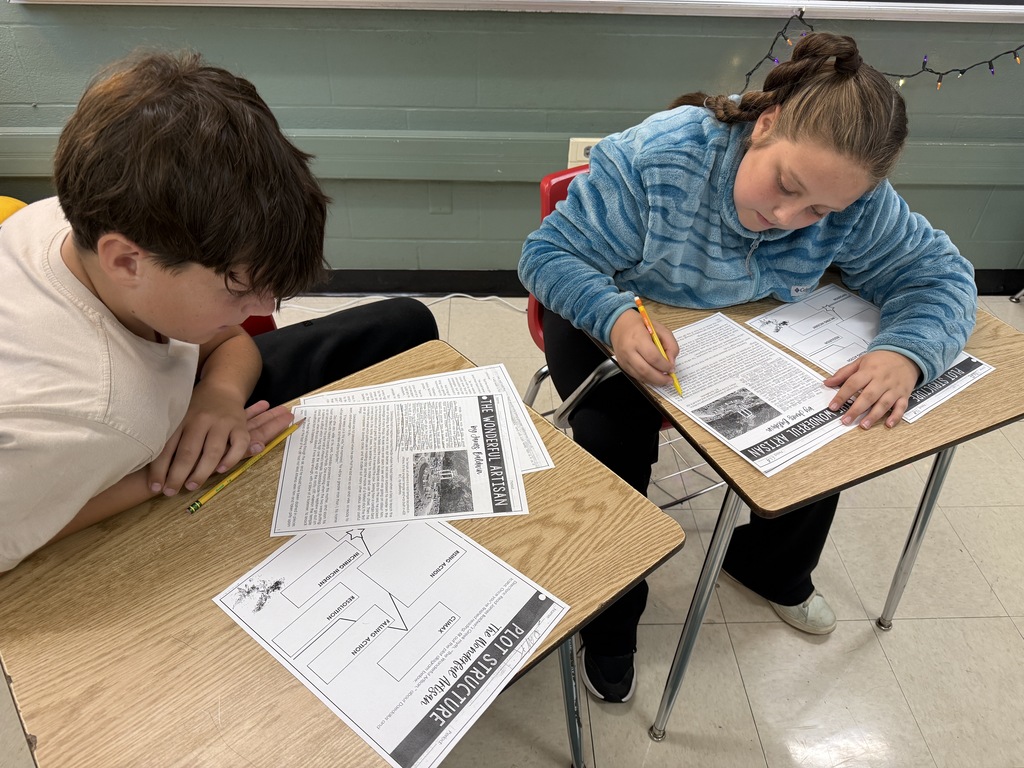Mrs. Parlier’s 6th grade classes working together reading and plotting Greek myths.