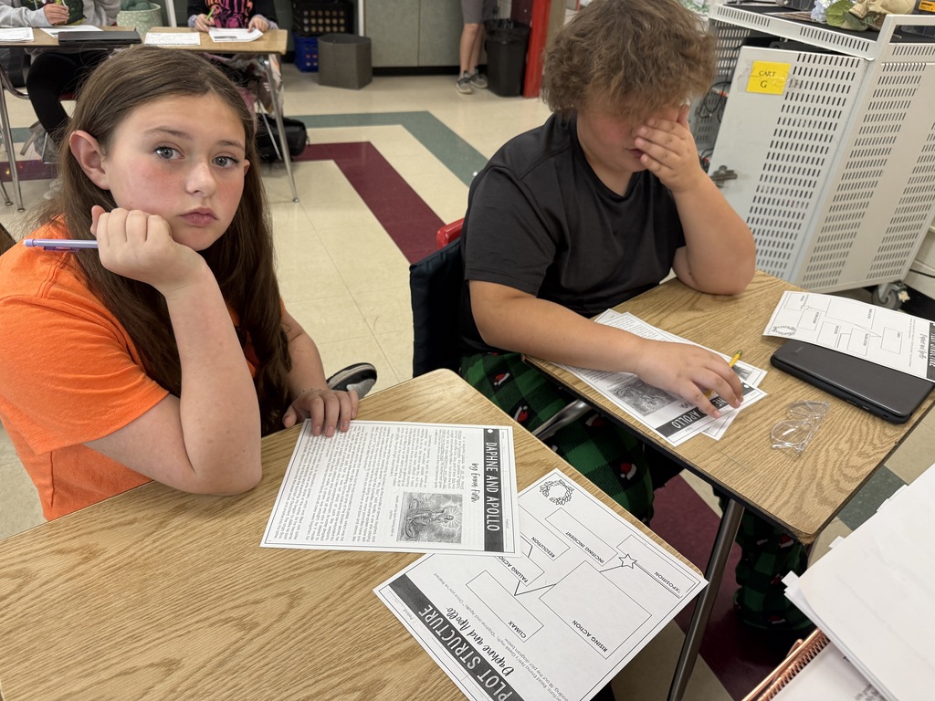 Mrs. Parlier’s 6th grade classes working together reading and plotting Greek myths.