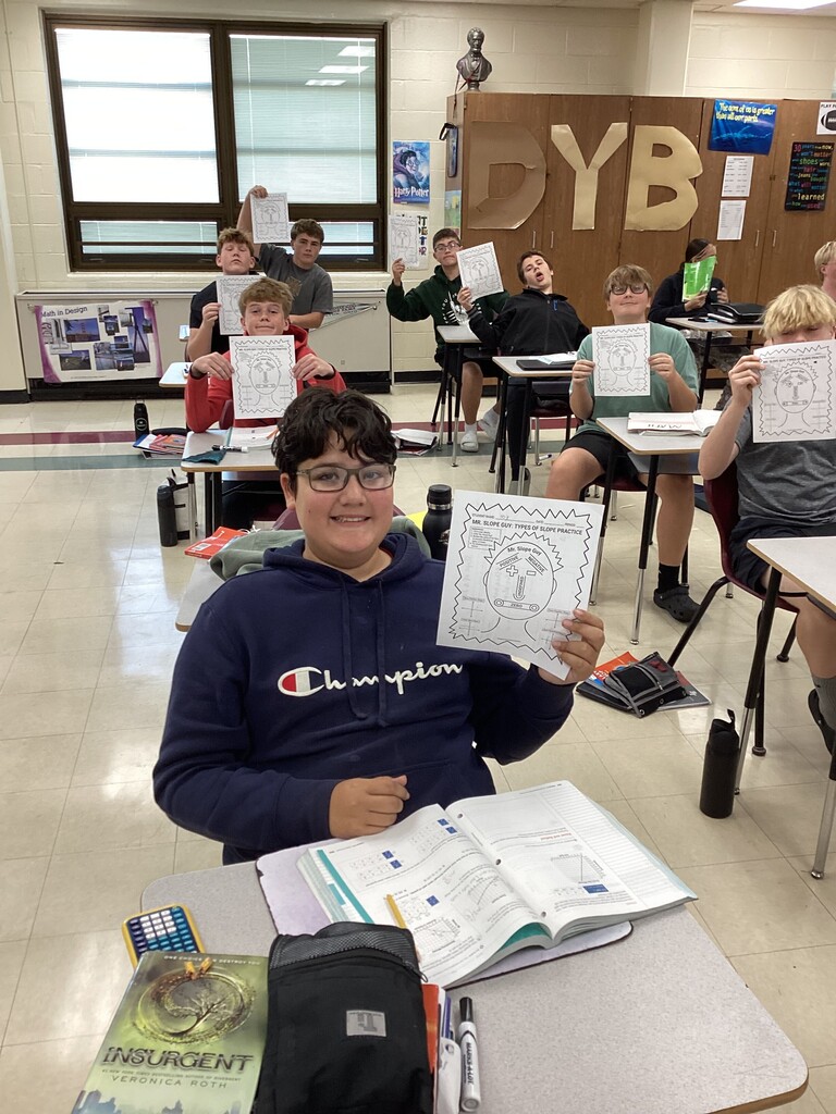 Mr. Essig’s math class working with MR. SLOPE GUY. This is a visual representation of slope that makes a face. Mr. Slope guy is a great study tool for our 8th graders.
