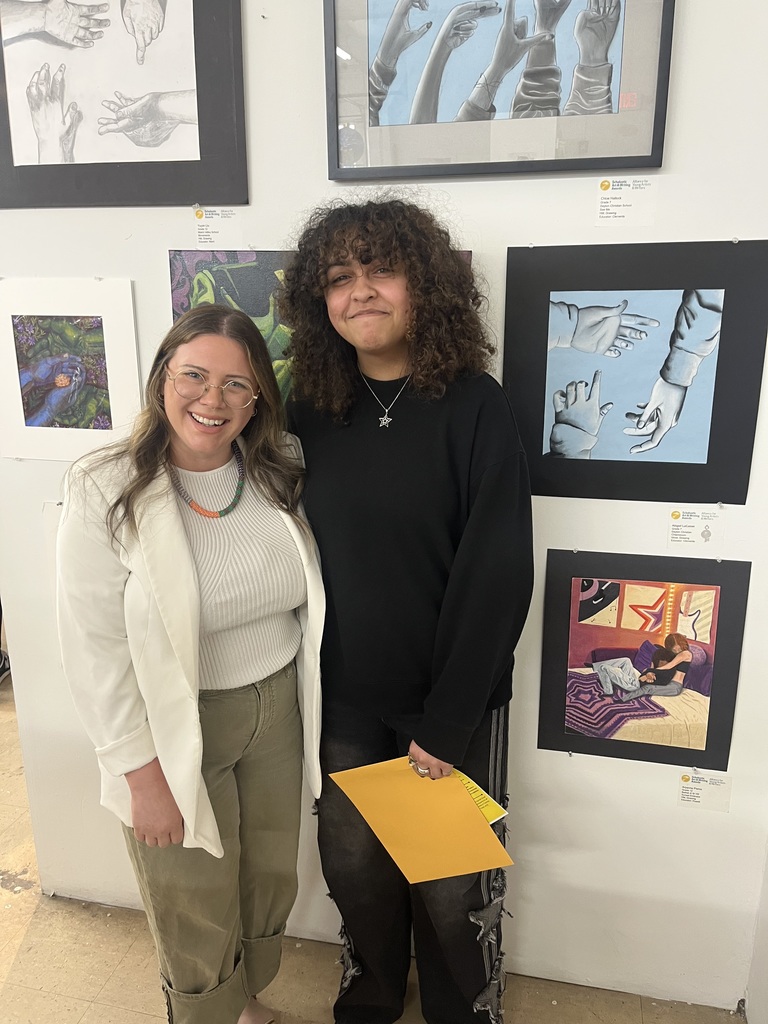 Ms. Powell and Ary Pierce at the Scholastics Art Exhibition
