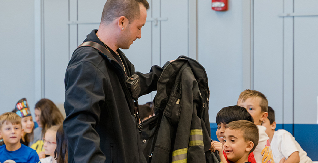 Kramer Lane Elementary students learn fire safety from local heroes