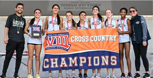 It's been an extraordinary fall season for Bethpage's female athletes, with two varsity teams claiming conference championships and the girls cross country team heading to the state championship this weekend after winning county. From the pool to the court to the trails, Bethpage girls have proven themselves unstoppable.  The girls varsity swim team closed out their dual meet season with a flawless 7-0 record, crowned Conference 4 champions. The Eagles dominated their final league meet of the season, remaining undefeated throughout conference competition.  A standout performance came from seventh grader Adelyn Burleson, who qualified for county in the 500 freestyle – an impressive achievement for such a young athlete. The team went on to capture the Division A Championship on Oct. 28.  The 2025 Bethpage Girls Varsity Volleyball team continued their winning tradition, securing the Conference AA2 Championship with a stellar 17-1 overall record and 15-1 conference record.  A season highlight included a sweep of Hicksville in three straight sets during their Dig Pink game, which raised money for cancer research. The team's success this year builds on strong momentum from their 2024 season, establishing Bethpage as a volleyball powerhouse.  Perhaps the most dramatic story of the fall belongs to the girls cross country team. After falling just one point short of qualifying for state last year – a heartbreaking loss to South Side – the Eagles have earned their redemption.  Bethpage captured the Class B team championship at the Nassau state qualifier meet on Nov. 8 at LIU Post's 5-kilometer course, scoring 54 points. All seven Eagles runners placed between sixth and 20th, showcasing the team's incredible depth. The undefeated squad (5-0 overall, 5-0 in Nassau Conference 3A) now heads upstate to Queensbury High School for the public school state championships this weekend.  These achievements represent more than just wins and championships – they demonstrate the dedication, teamwork and resilience of Bethpage's female athletes. From a seventh grader making county to a cross country team turning last year's disappointment into this year's triumph, these young women are writing their own success stories.  Congratulations to all our amazing athletes, and best of luck to our cross country team this weekend. Bring home that state title!