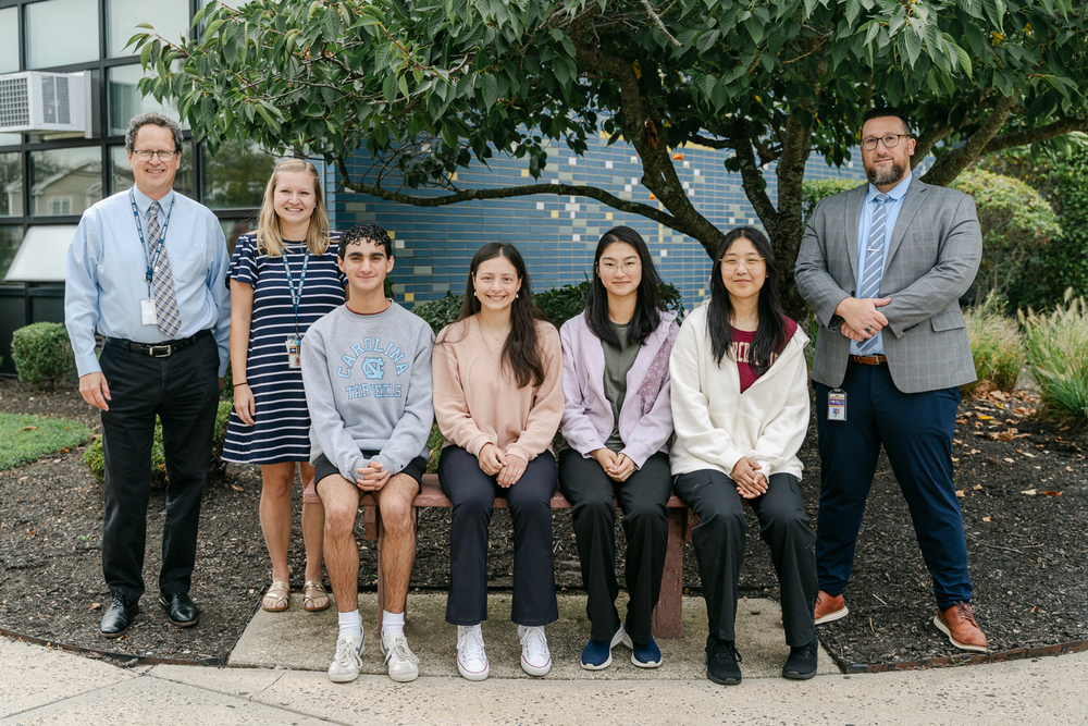 Four Bethpage High School Students with staff