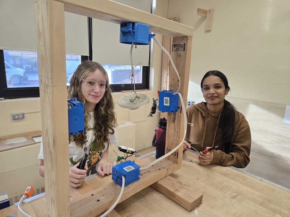 Student in Bethpage High School's Home Improvement Class master electrical circuits!