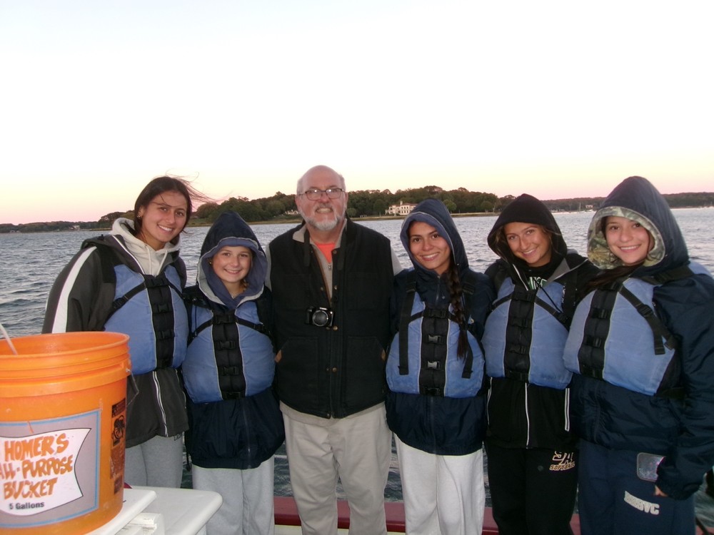 Students set sail with lifejackets with Mr. Portuese.