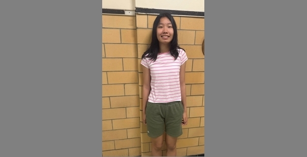 girl in striped shirt and shorts